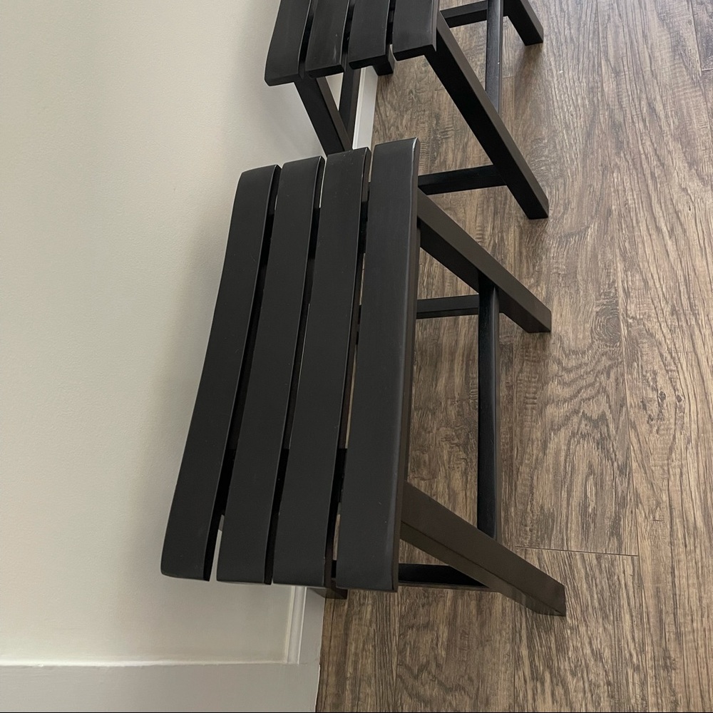 PAIR OF BLACK WOODEN STOOLS